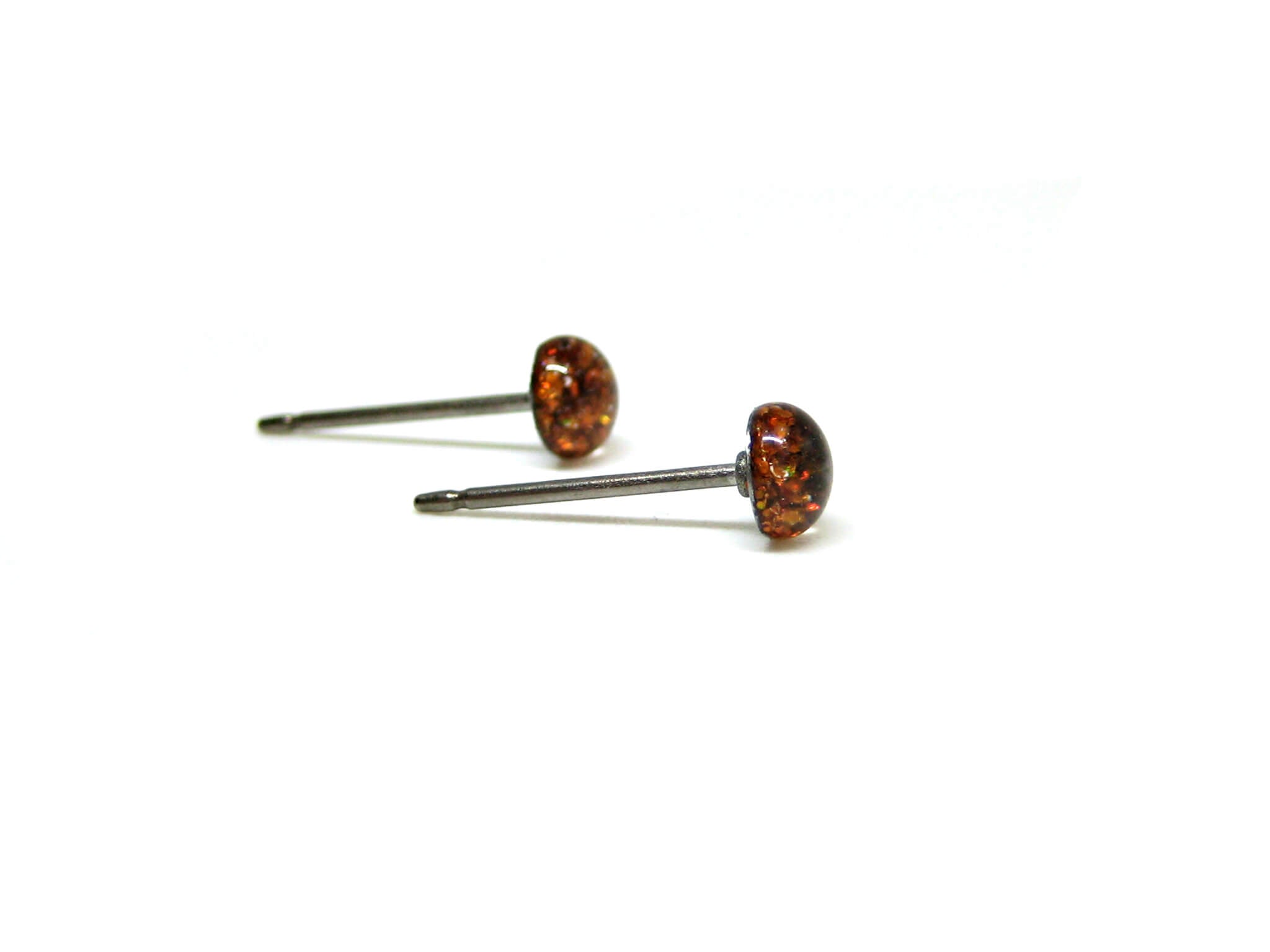 Cepheus Copper orange glitter stud earrings