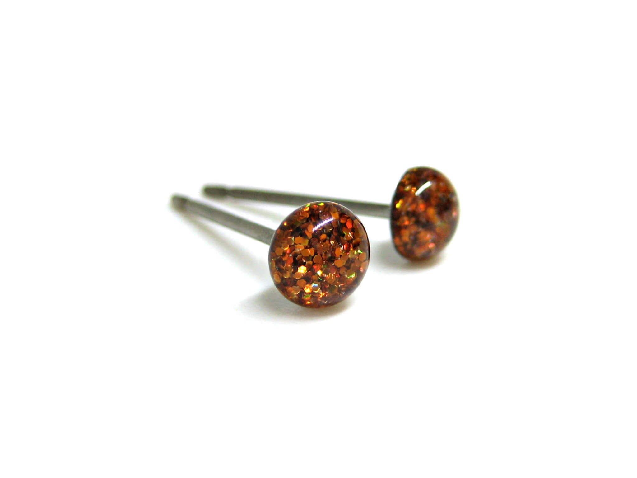 Cepheus Copper orange glitter stud earrings