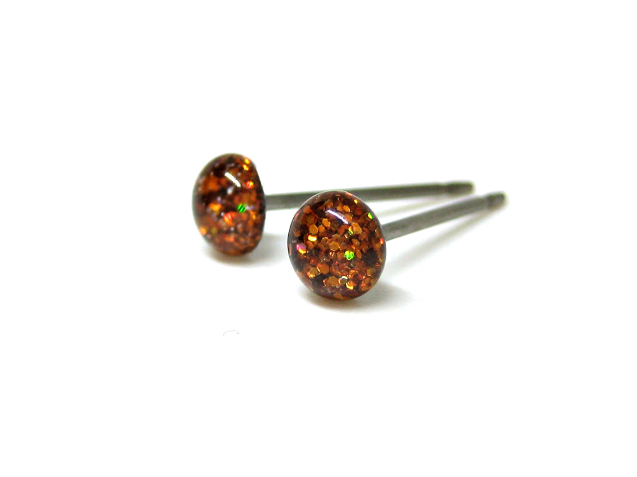 Cepheus Copper orange glitter stud earrings