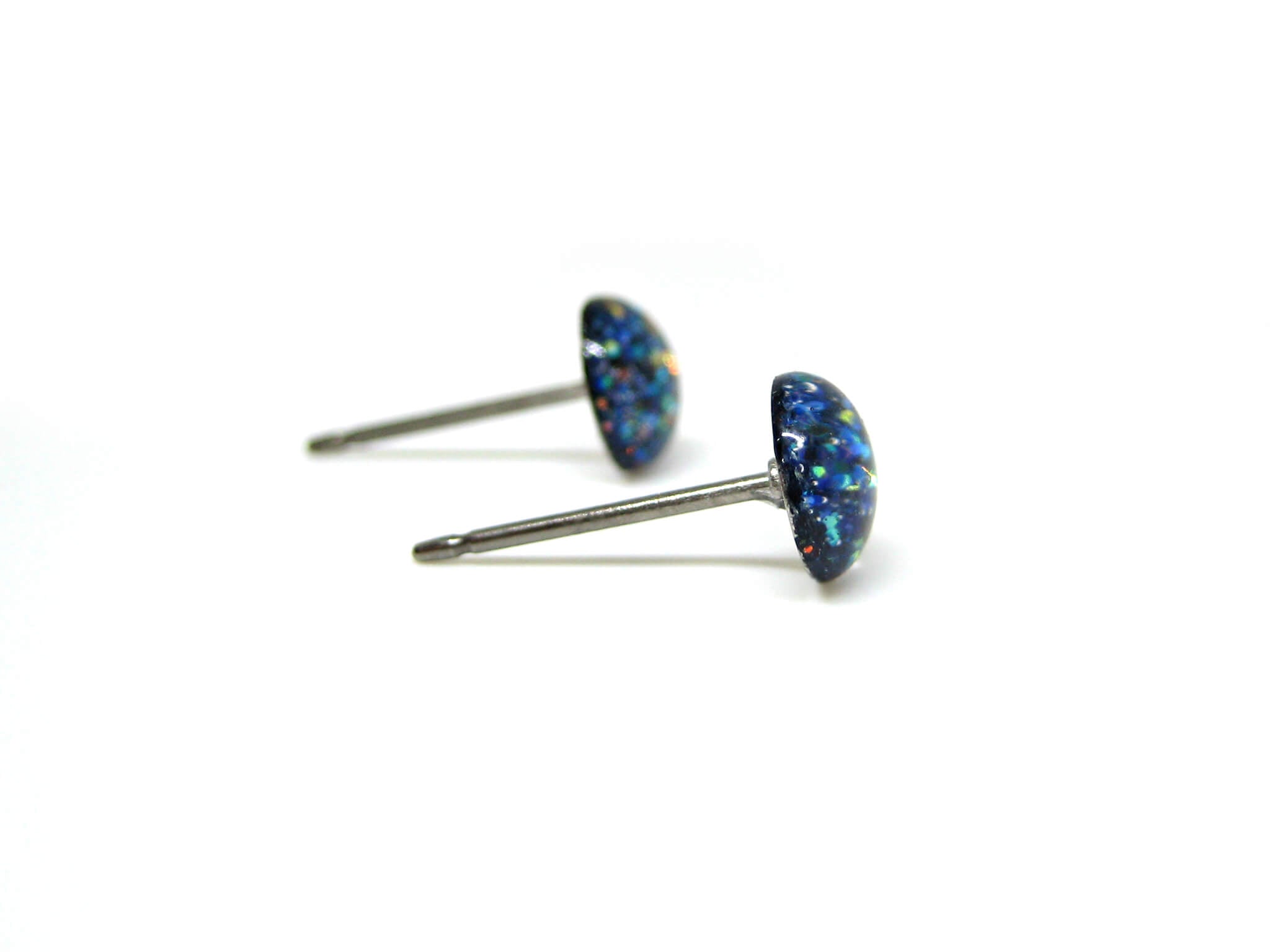 echos of winter dark blue glitter stud earrings