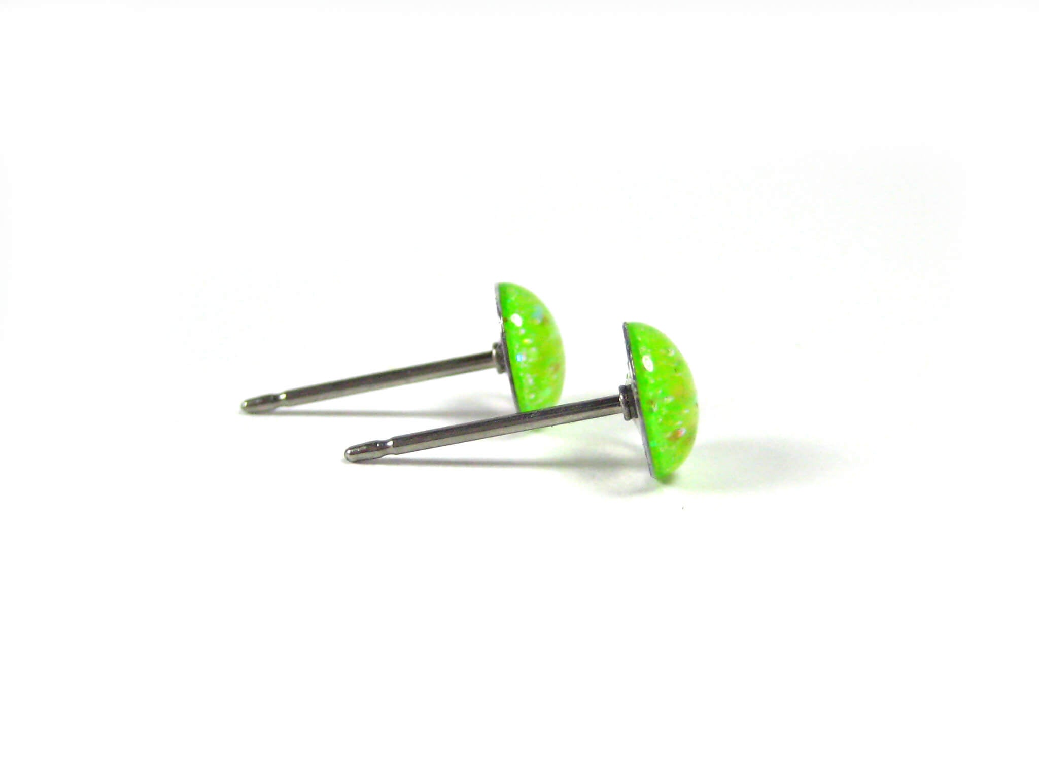 harlequin radiance light green glitter stud earrings