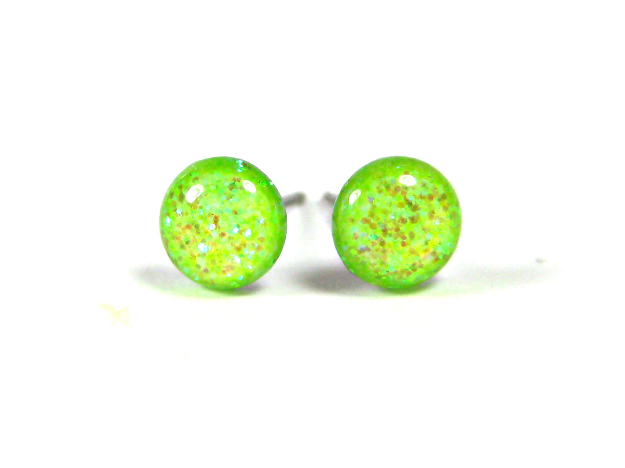 harlequin radiance light green glitter stud earrings